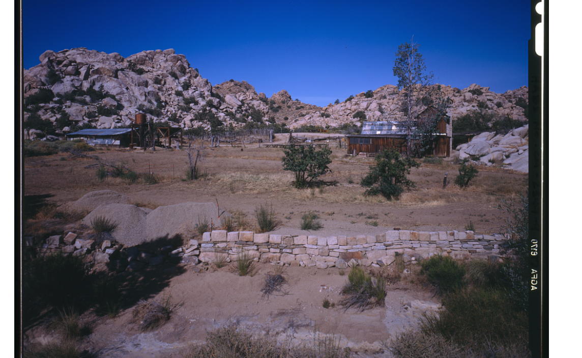 The Desert Queen Ranch with mountains in background